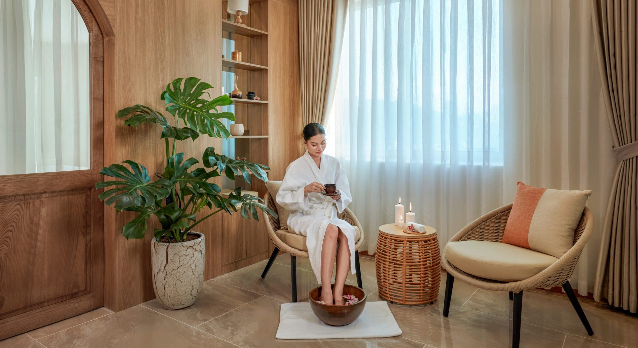 Guest relaxing with a foot soak treatment at Horizon Spa